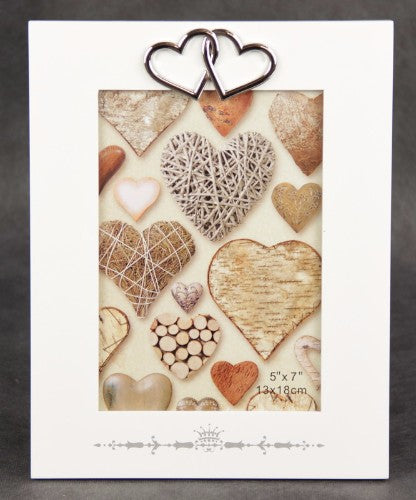 Elegant white photo frame with double heart accents, perfect for showcasing cherished memories and special moments.