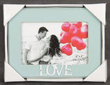 Turquoise 4x6 photo frame showcasing vibrant color and elegant design, perfect for displaying cherished memories.