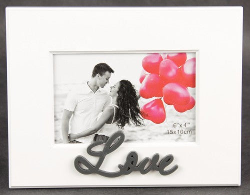 Elegant 4x6 photo frame with "Love" inscription, perfect for showcasing cherished memories in any decor style.