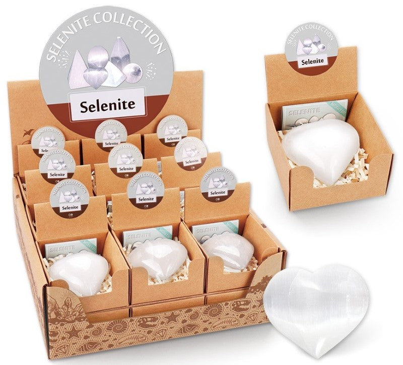 A box of 18 enchanting Selenite Heart crystals for energy-clearing, emotional healing, and meditation practices.