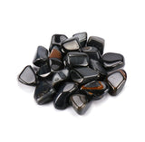 Tumbled Blue Tiger Eye stones in a 0.5kg box, showcasing deep blue tones and natural banding for healing and decor.