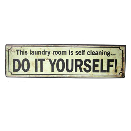 Vintage metal plaque reading, "This laundry room is self-cleaning… Do it yourself!" Ideal for quirky home decor.