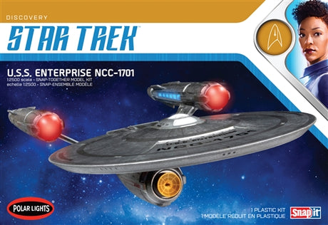 Model kit of the 1/2500 ST Discovery Enterprise, measuring 12 inches, with 29 detailed parts and customizable decals.