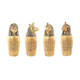 Set of 4 gold Egyptian canopic jars, each 12cm tall, crafted from resin, perfect for decor or treasure storage.