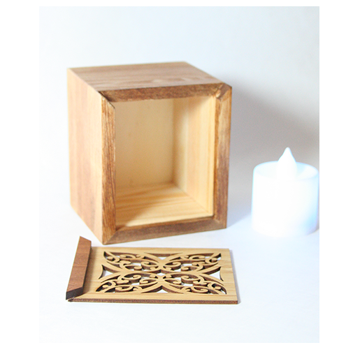 LED tealight box made of laser-cut bamboo, featuring a color-changing candle and trinket storage, beautifully packaged.