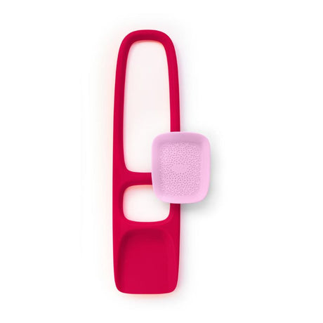 Bright cherry red spade for kids featuring a detachable sand sifter, ideal for imaginative beach play and sandcastle building.