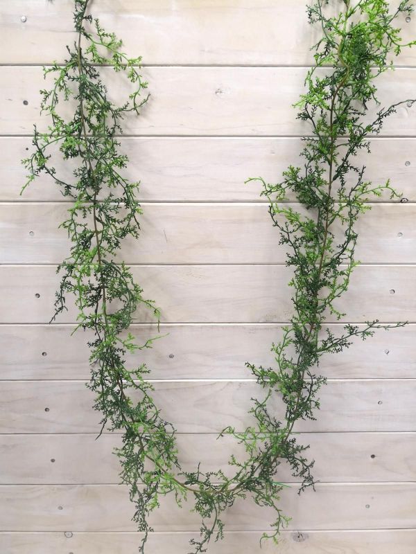 Vibrant 1.8m Sweet Annie Fern Garland in lush green, perfect for home decor and special occasions.