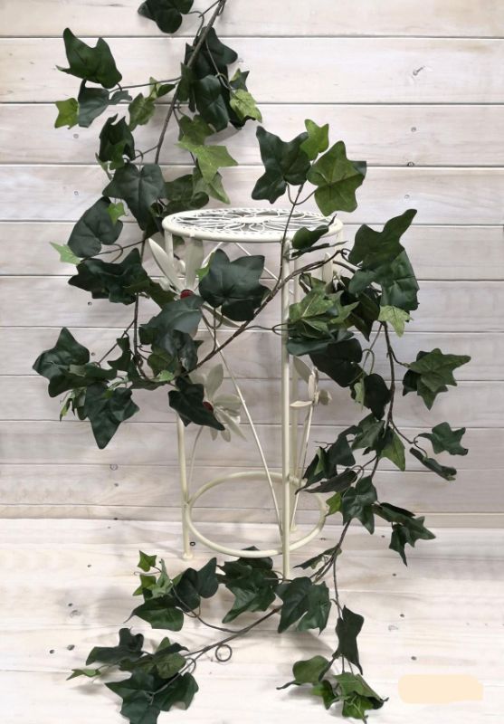 Lush 1.8m green ivy garland, perfect for home decor, events, and DIY projects, offering elegant, maintenance-free natural beauty.