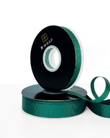 Durable 13mm grosgrain ribbon in lush Hunter Green, perfect for crafting, bows, and elegant embellishments, 30 meters long.