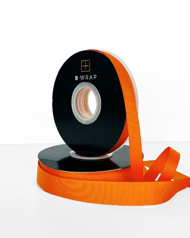 Vibrant orange grosgrain ribbon, 13mm x 30m, perfect for gift wrapping and DIY projects with a rich texture.