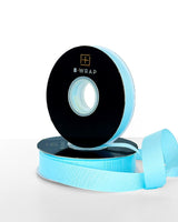 Pale blue 13mm Grosgrain ribbon, perfect for crafting, gift wrapping, and DIY projects with a textured and durable finish.