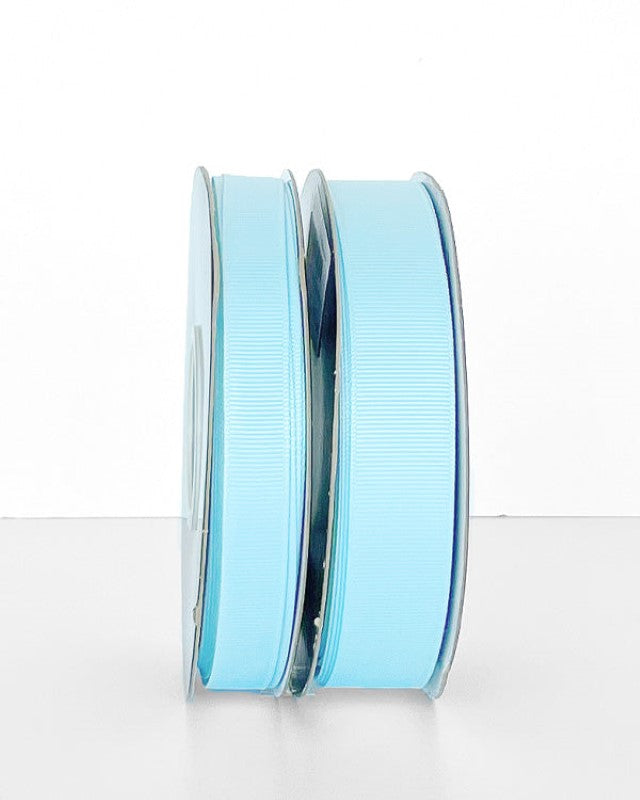 Pale blue 22mm grosgrain ribbon roll, 30 meters long, perfect for crafting, gift wrapping, and elegant embellishments.