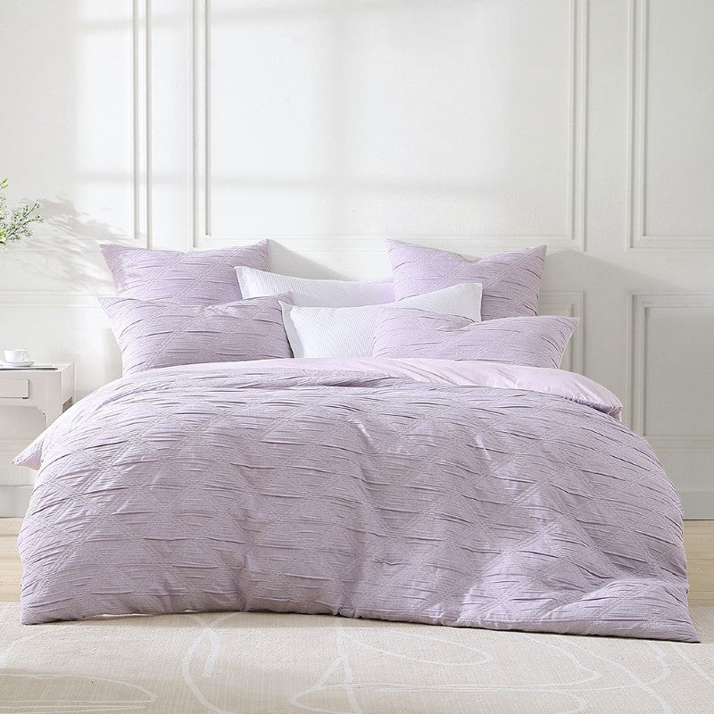 Super King duvet cover set in lilac with large diamond design and contrast stitching, includes duvet cover and two pillowcases.