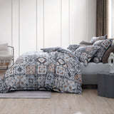 Queen duvet cover set in Restore Navy featuring oversized tile motifs and navy piping, crafted from premium cotton sateen.