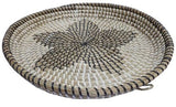 Seagrass dish with plastic weaving, featuring a raised edge, perfect for serving snacks or as a stylish home decor accent.