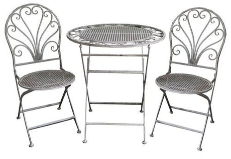 Antique grey garden chair featuring ornate detailing, perfect for stylish outdoor dining and relaxation.