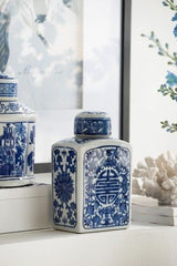 Blue and white decorative lidded jar by Rembrandt, perfect for storage or as a striking centerpiece in any room.