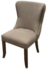 Elegant grey linen dining chair with buttoned back, solid oak frame, combining luxury and comfort for any dining space.