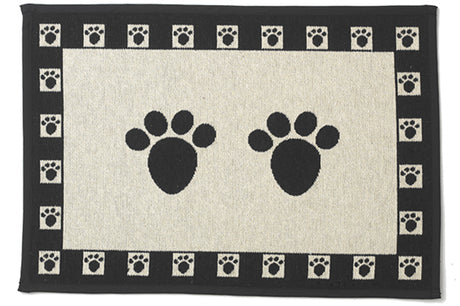 Stylish black paws design dog feeding mat, 48cm x 33cm, non-skid, machine washable for easy cleanup.