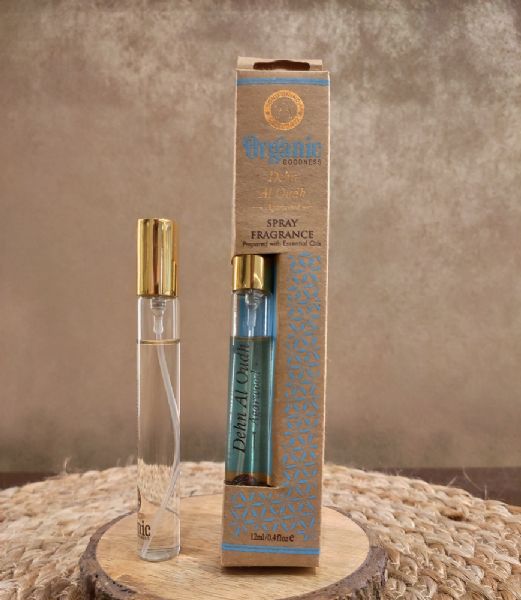 Luxurious 12 ml perfume spray in a sleek glass bottle, featuring warm, woody notes of organic Dehn Al Oudh-Agarwood.