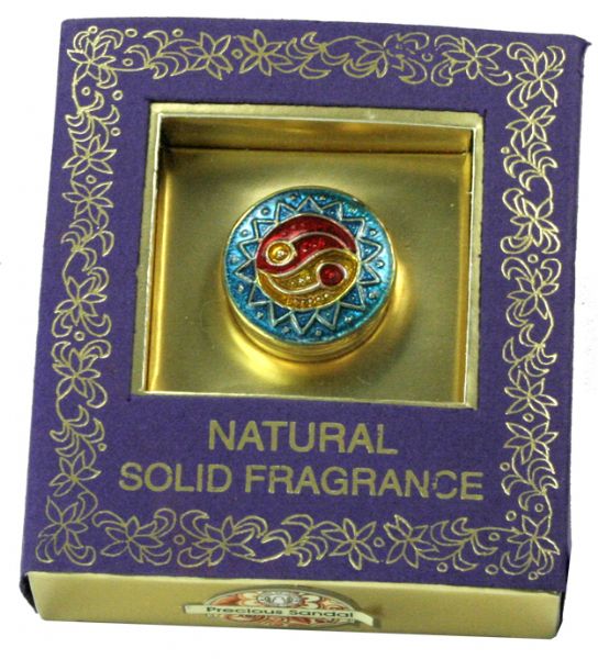 Luxurious solid perfume with earthy sandalwood notes, conveniently packaged for on-the-go use and suitable for all skin types.