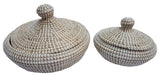 Set of 2 eco-friendly seagrass baskets with plastic weaving, ideal for stylish storage in any room.