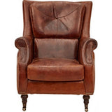 Vintage cigar leather armchair with brass nail detailing, oak feet, and metal casters, designed for comfort and durability.