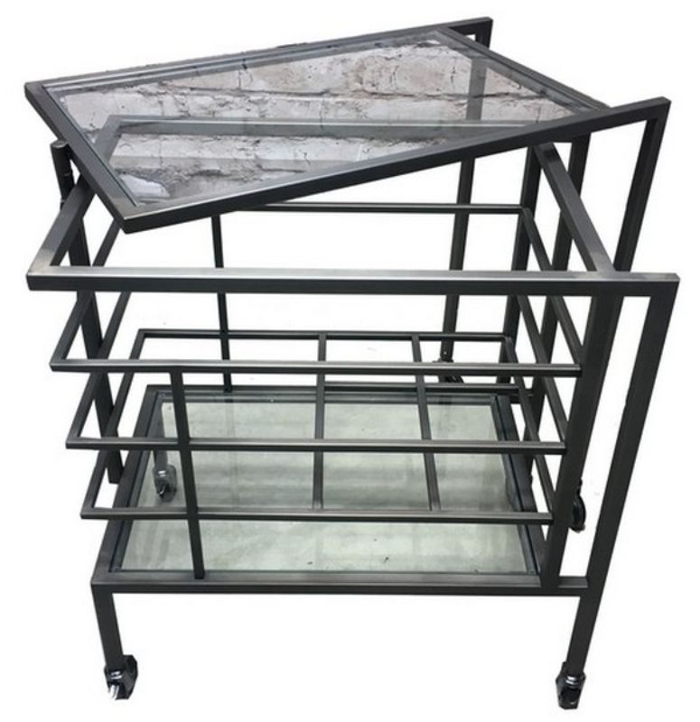 Elegant 86cm cocktail trolley featuring a clear glass top, stainless steel frame, and smooth-rolling wheels for effortless entertaining.