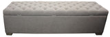 Grey linen ottoman blanket box with metal handles, stylishly storing blankets while enhancing any bedroom decor.