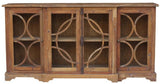 Elegant antique timber side board with Art Nouveau curves, featuring four doors and ample storage for stylish home decor.