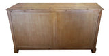 Rustic sideboard with chicken wire doors, crafted from 50-year-old pine; perfect for stylish storage in any room.