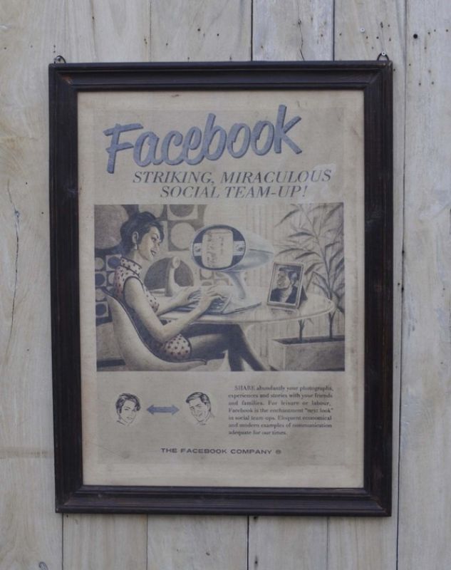 Framed Facebook art in vibrant colors, perfect for modernizing decor and celebrating social media culture in any room.