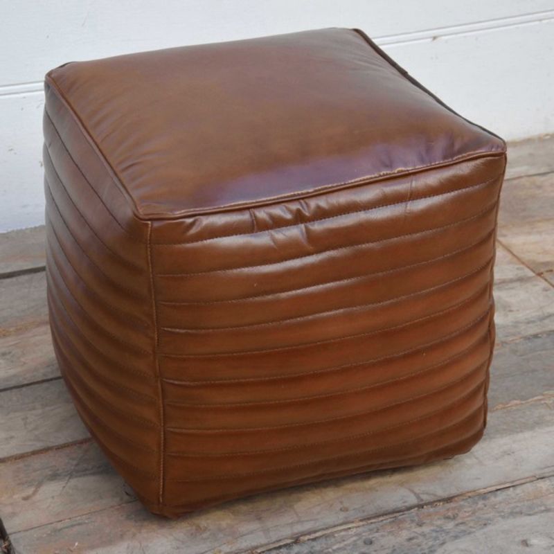 Stylish square leather pouf in premium buffalo leather, perfect for seating or decor in any modern living space.