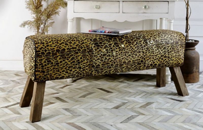 Leopard print leather long vault stool featuring a durable mango wood frame, perfect for stylish seating or footrest.