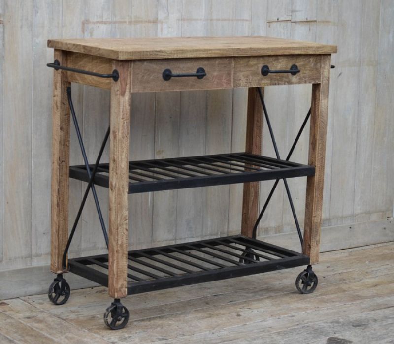 Stylish mango wood kitchen island with wheels, two drawers, and a durable surface for meal prep and entertaining.