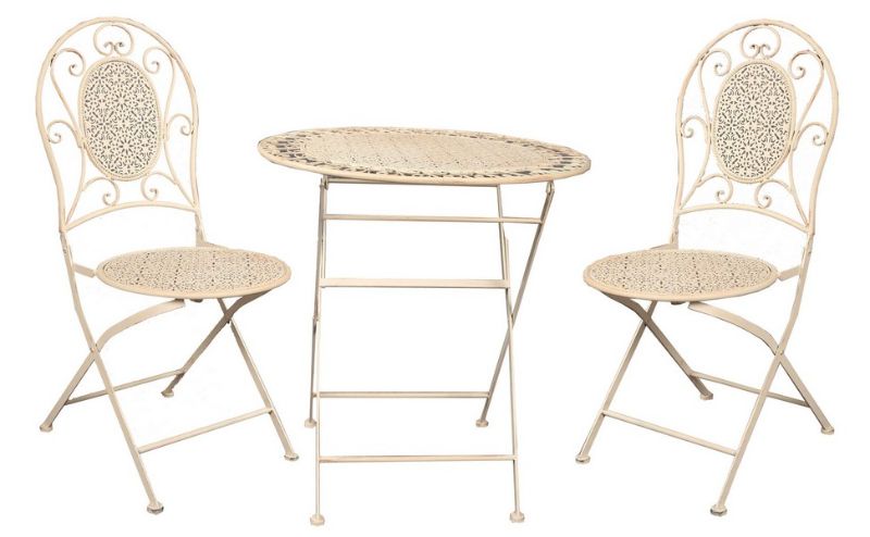 Elegant cafe setting with antique white finish, ornate chairs, and durable metal design, perfect for outdoor gatherings.