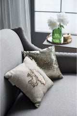 Elegant cushion set of 2 (40cm) featuring a soft cream cushion and a shimmering metallic sequinned pillow, perfect for decor.