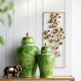 Green 60cm ceramic jar with lid, featuring a unique shape and rich green hues, perfect for decor and storage.