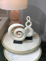 Elegant 34cm Kiwiana Sculpture with a white swirl pattern on a squared base, perfect for modern decor and stylish accents.