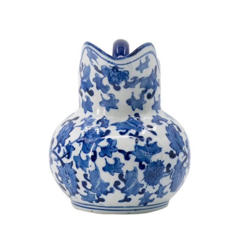 Elegant blue and white porcelain milk jar (22cm) with sculpted handle, perfect for traditional kitchen decor.