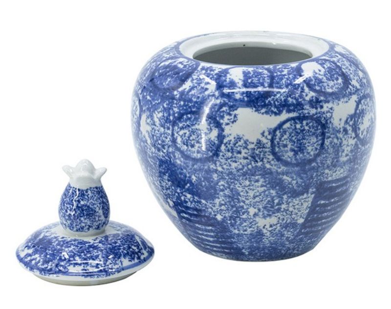 Elegant 26cm lidded jar in blue and white porcelain, featuring a round shape and intricate abstract pattern, perfect for decor.