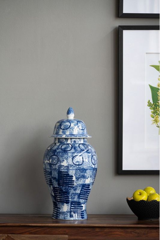 Elegant 50cm blue and white lidded ginger jar with abstract pattern, perfect for enhancing various decor styles.