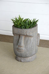 Easter Island Statue Planter in rustic stone finish, perfect for adding artful elegance to gardens or interiors.