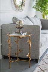 Antique nickel votive holder with gold accents, featuring a smoke glass shade and walnut base for elegant tabletop decor.