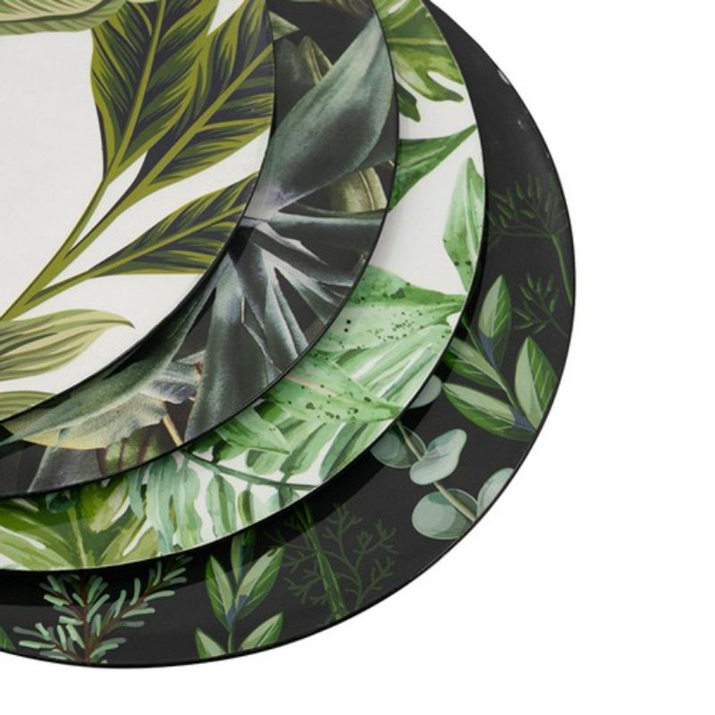 Stylish set of 4 green palm pattern charger plates, perfect for modern dining decor and enhancing tabletop aesthetics.