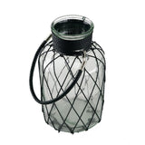 Small clear glass vase with durable leather handle, ideal for showcasing floral arrangements in any decor setting.