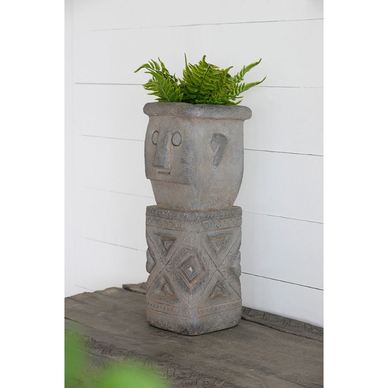 Vintage stone Tribe Plant Pot, 50cm tall, with tribal carvings, ideal for indoor and outdoor plants, adding rustic charm.