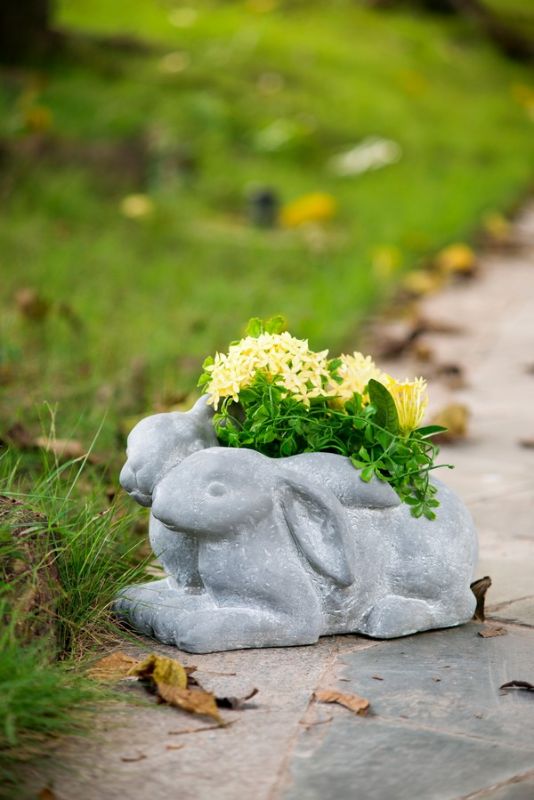 Charming 30cm rabbit planter in gray fibreglass resin, perfect for vibrant blooms, herbs, or succulents indoors or outdoors.