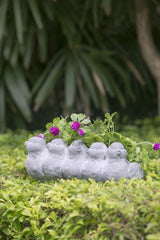 Whimsical 30cm gray planter featuring intricate bird designs, perfect for vibrant blooms or succulents in any setting.