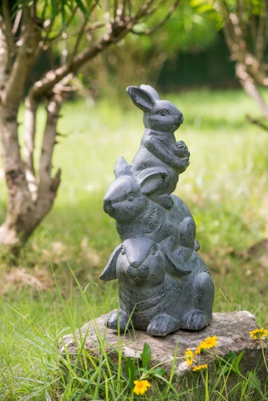 Charming Rabbit Family Planter in neutral gray, perfect for showcasing vibrant blooms, herbs, or succulents indoors and outdoors.